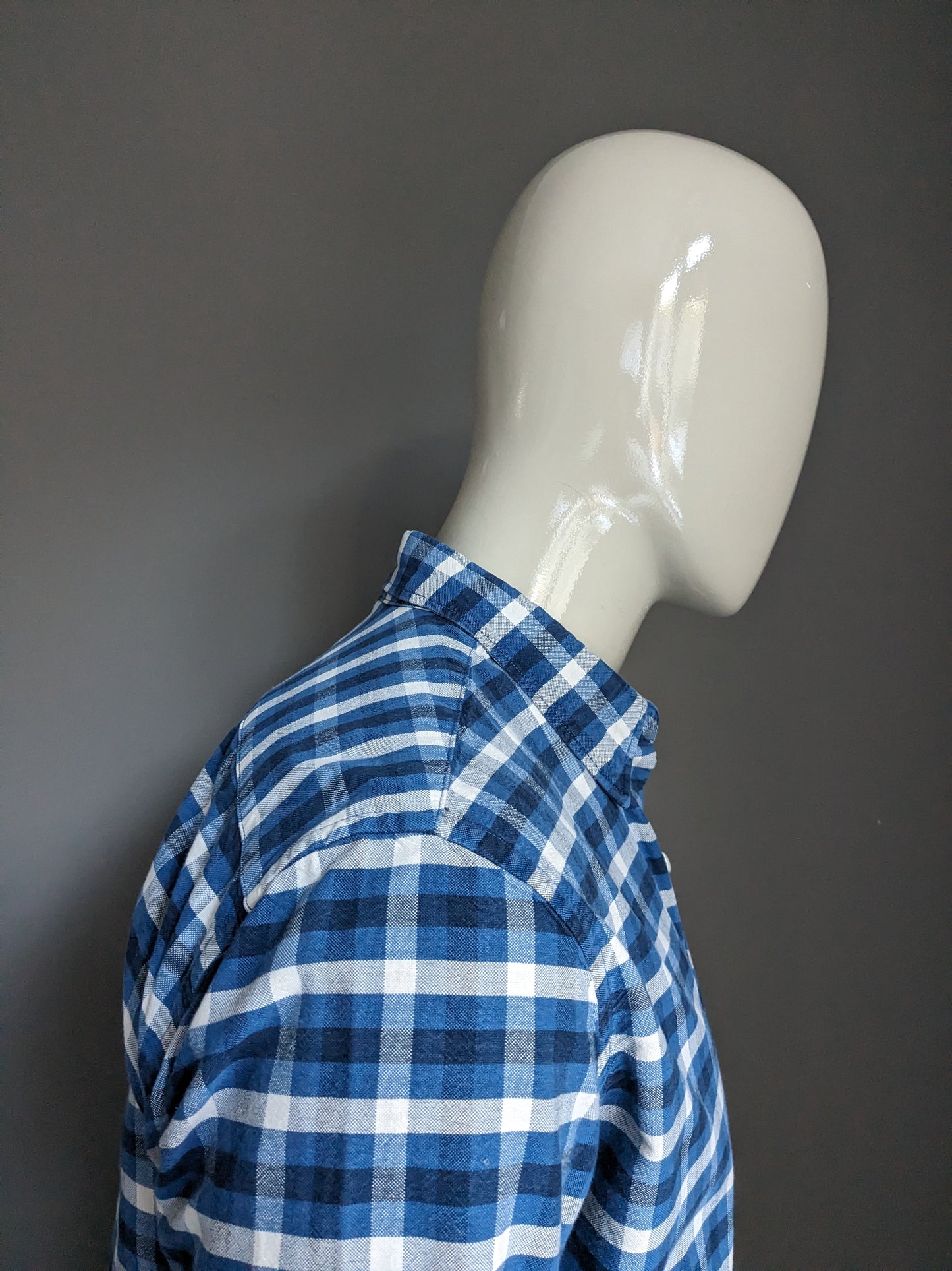 Shirt de flanelle de Levi. Blue blanc à carreaux. Taille L.