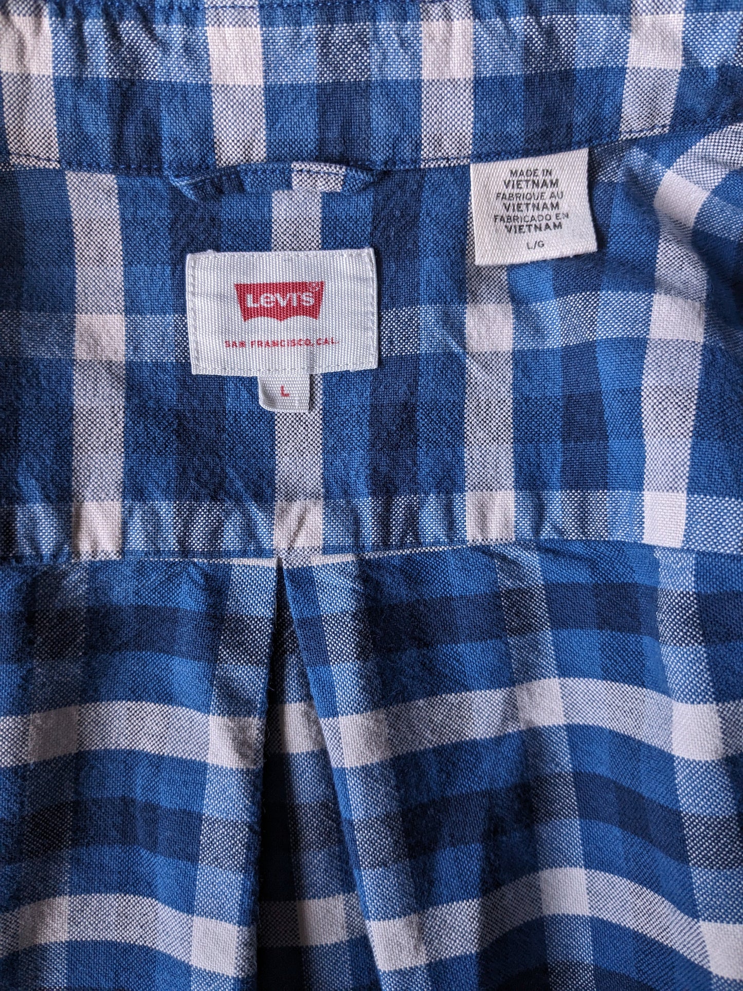 Levi's flannel shirt. Blue white checkered. Size L.
