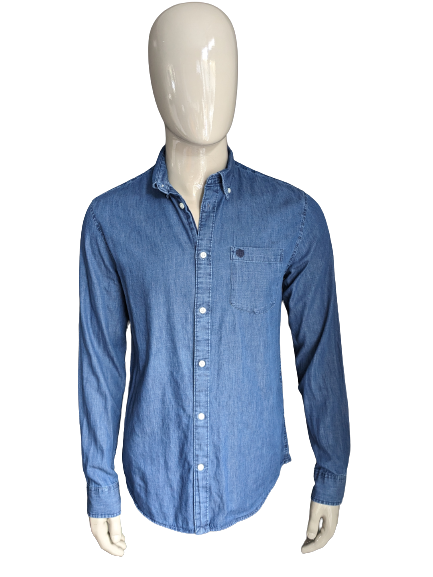 I jeans Homme selezionati sembrano camicia. Colorato blu. Taglia M. Fit regolare.