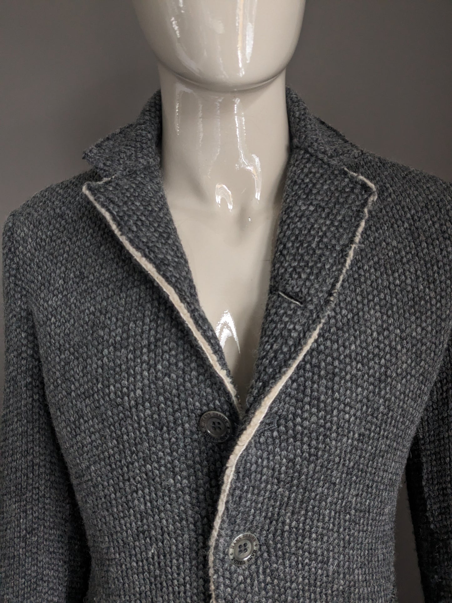 Hans Ubbink Wollen mantel / jas. Grijs voelbaar motief. Warm gevoerd. Maat 48 / M. 70% Wol.