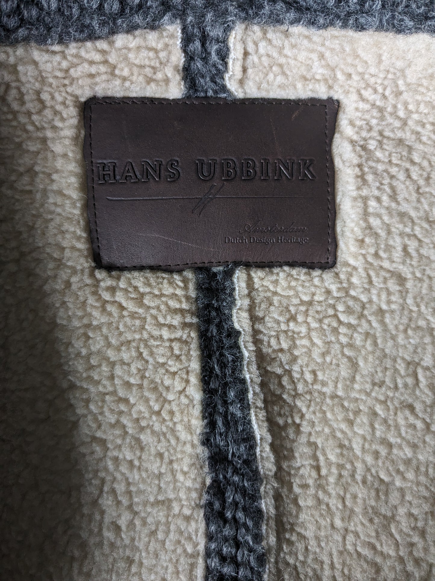 Hans Ubbink Wollen mantel / jas. Grijs voelbaar motief. Warm gevoerd. Maat 48 / M. 70% Wol.
