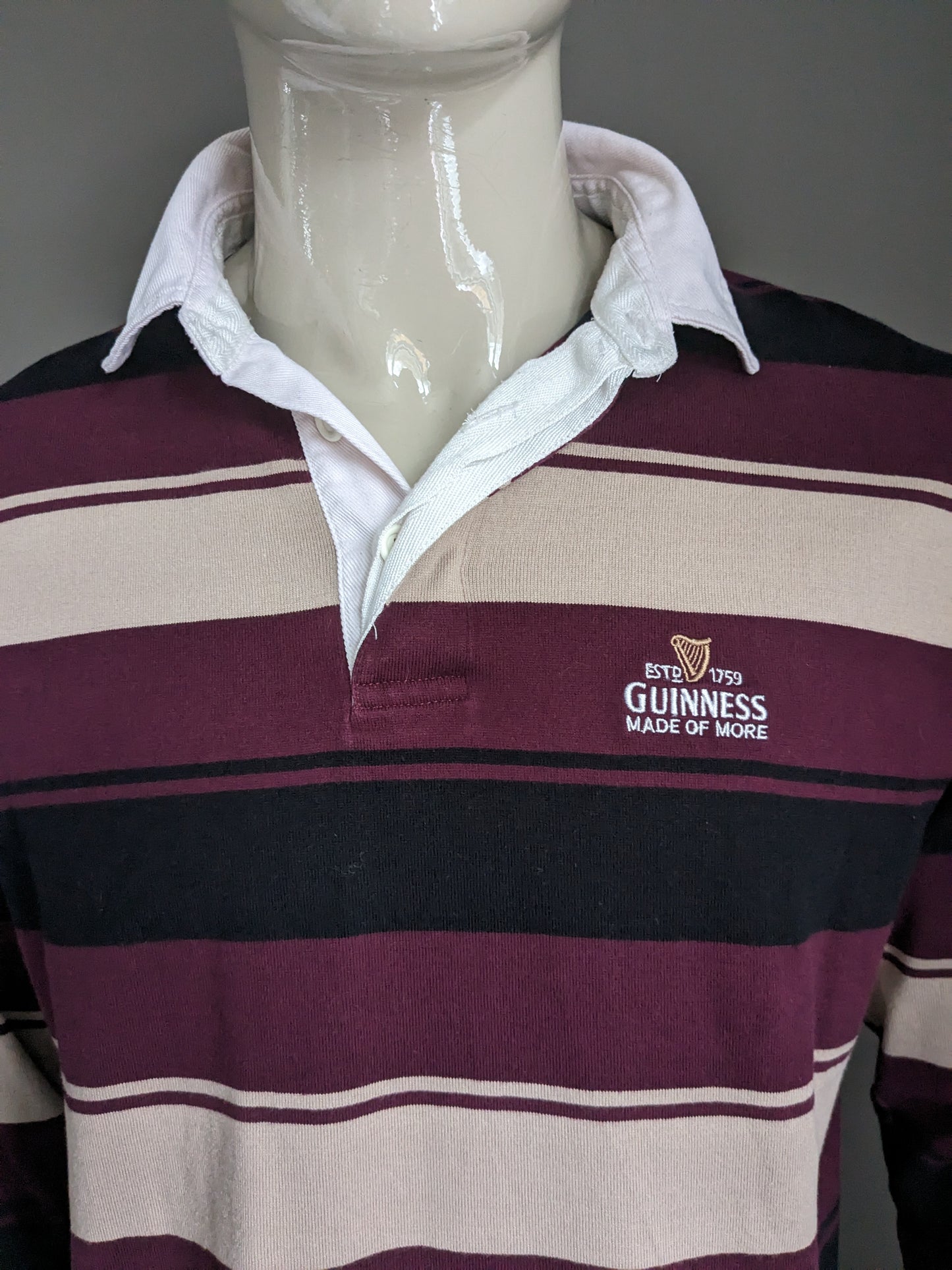 Pull polo Guinness. Bordeaux Beige Rayé Noir. Taille L.