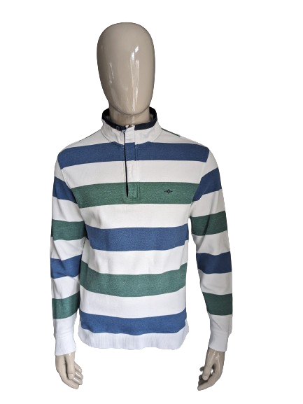 Pull Baileys avec fermeture éclair. Rayé bleu vert blanc. Taille XL.