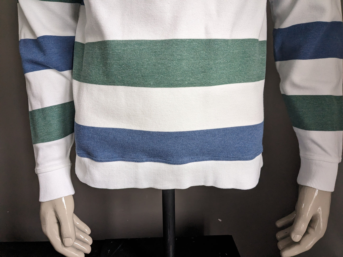 Pull Baileys avec fermeture éclair. Rayé bleu vert blanc. Taille XL.