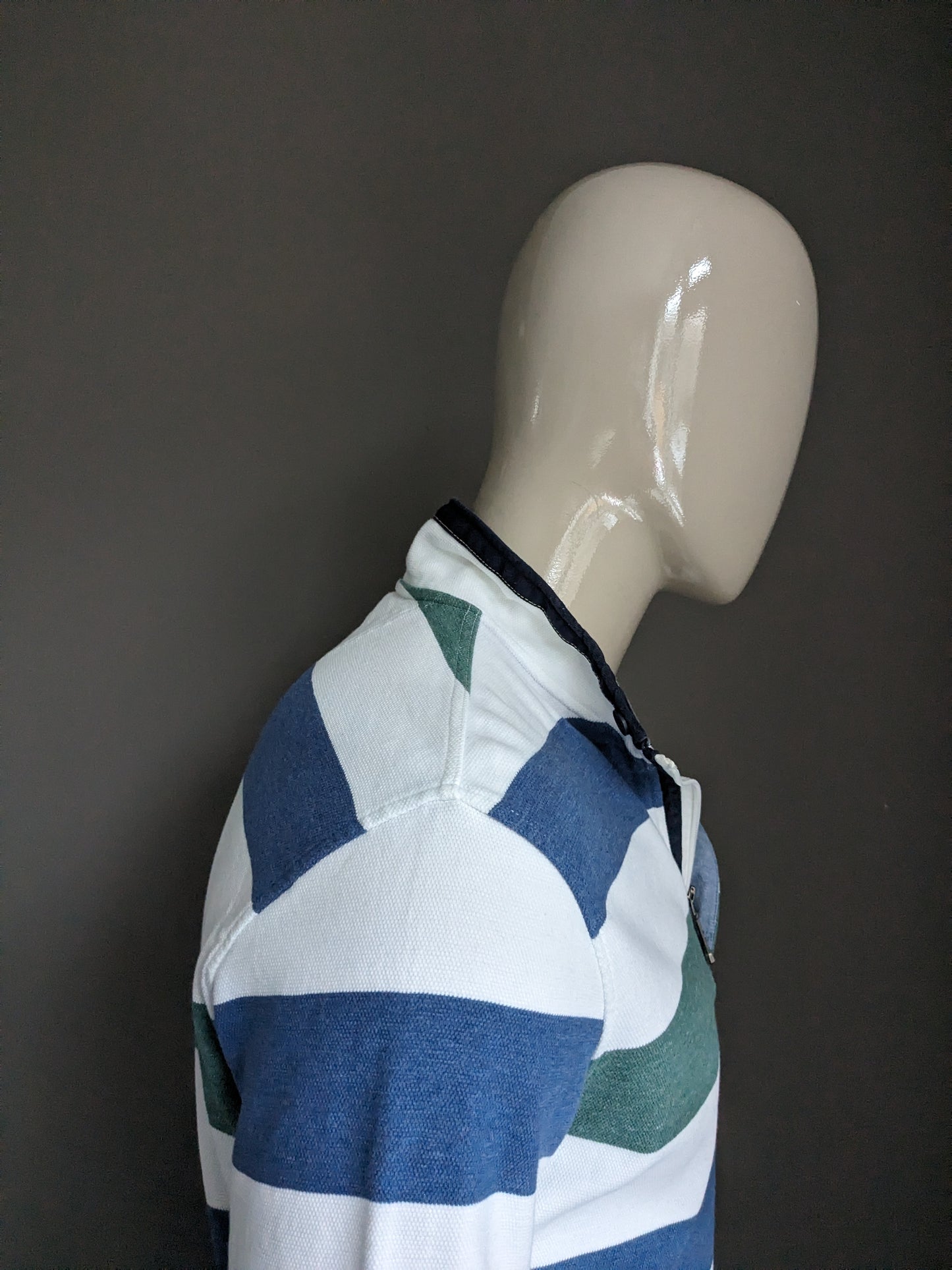 Pull Baileys avec fermeture éclair. Rayé bleu vert blanc. Taille XL.