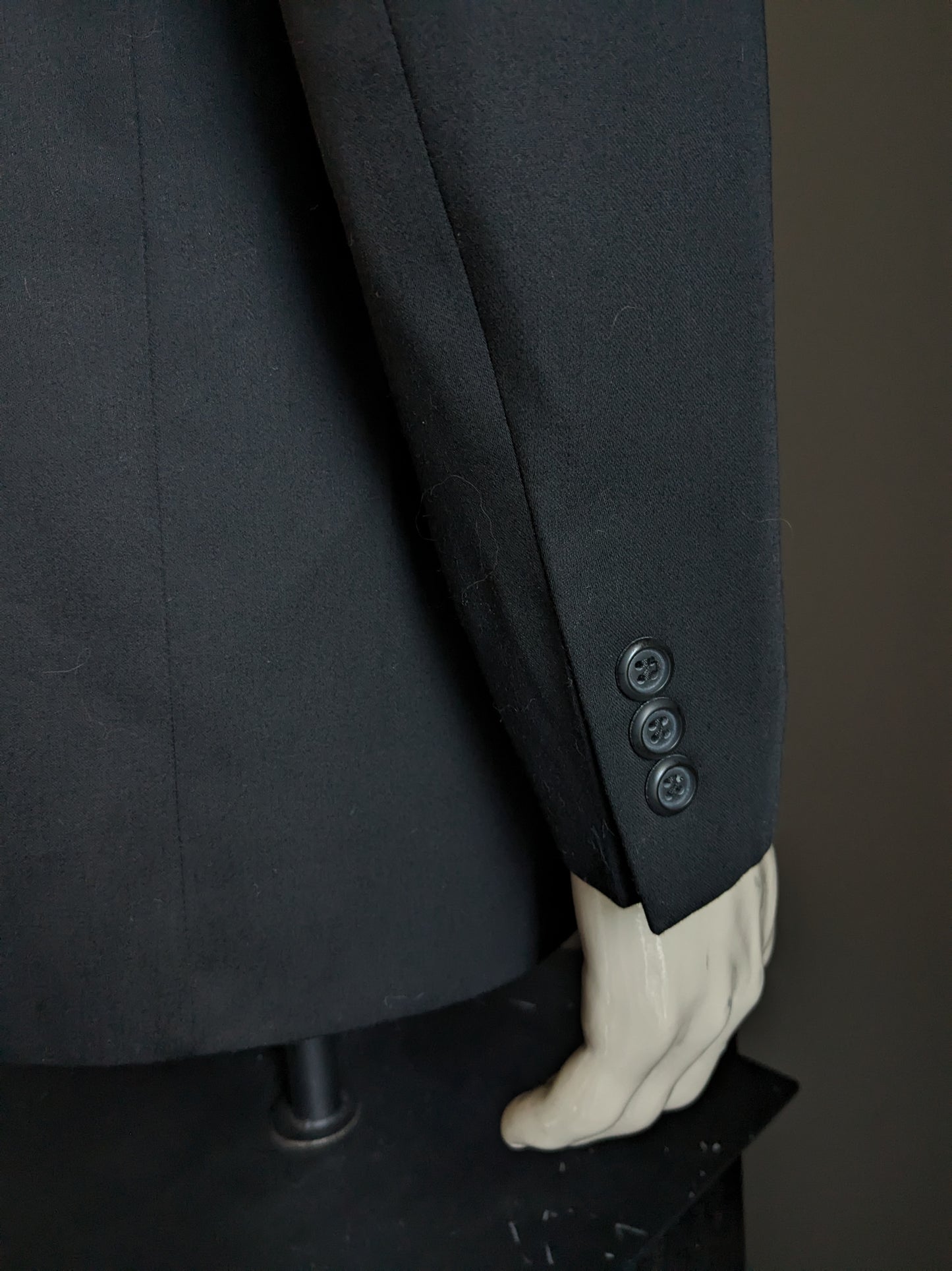La giacca di Burton. Colorato nero. Dimensione 52 / L. regolare.