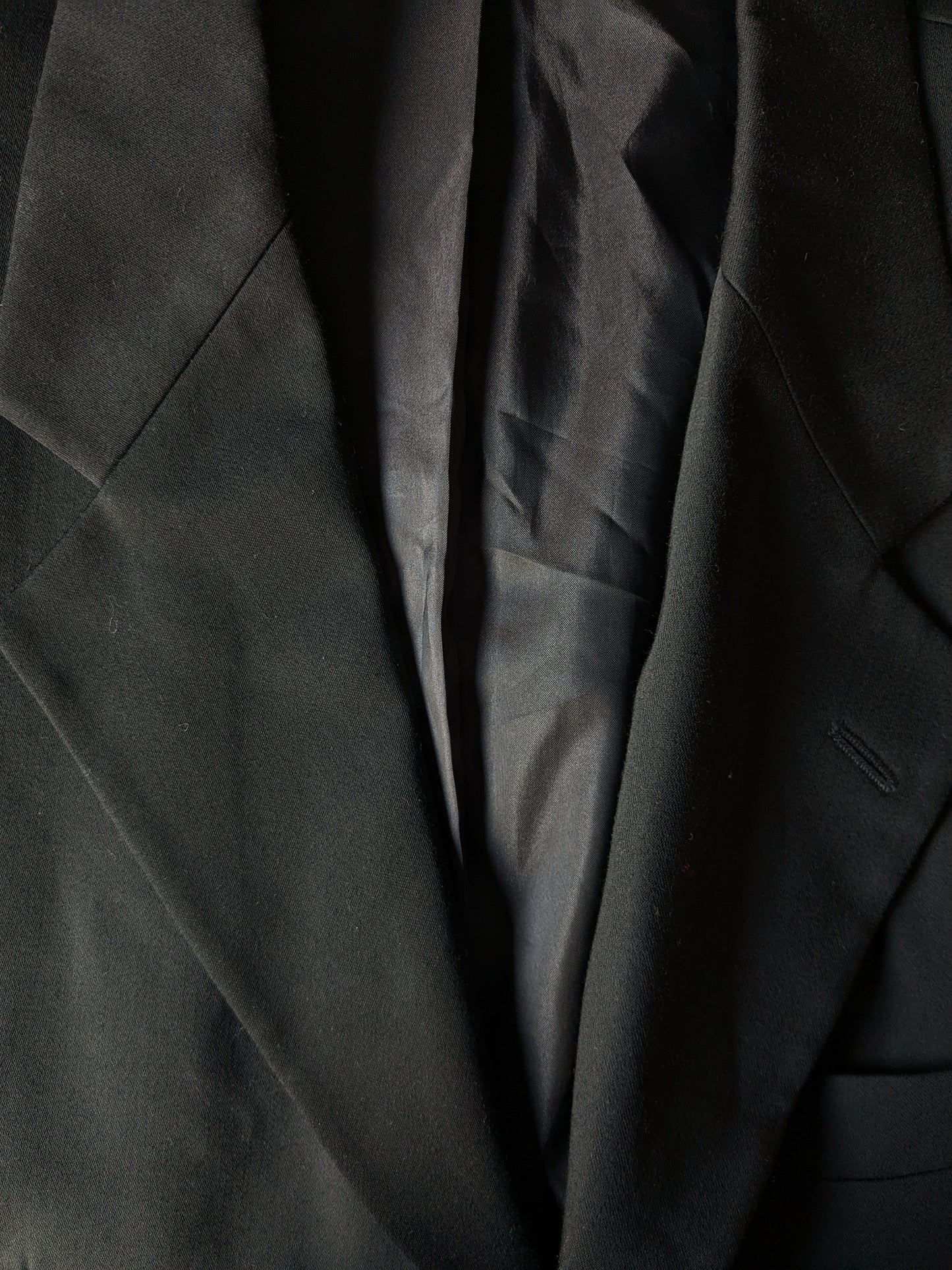 La chaqueta de Burton. Color negro. Tamaño 52 / L. Regular.