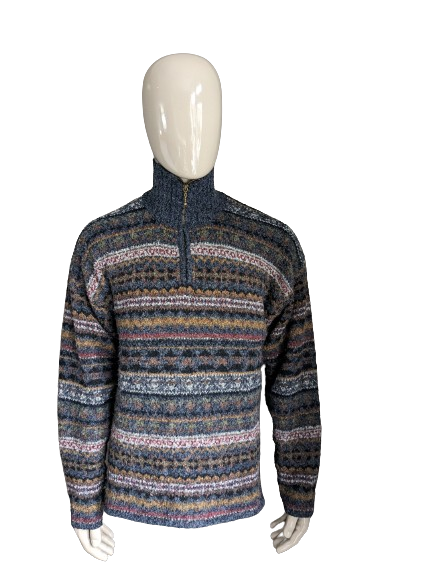 Suéter de lana de hormigón vintage con cremallera. Azul marrón rojo verde coloreado. Tamaño L. (12% de lana)