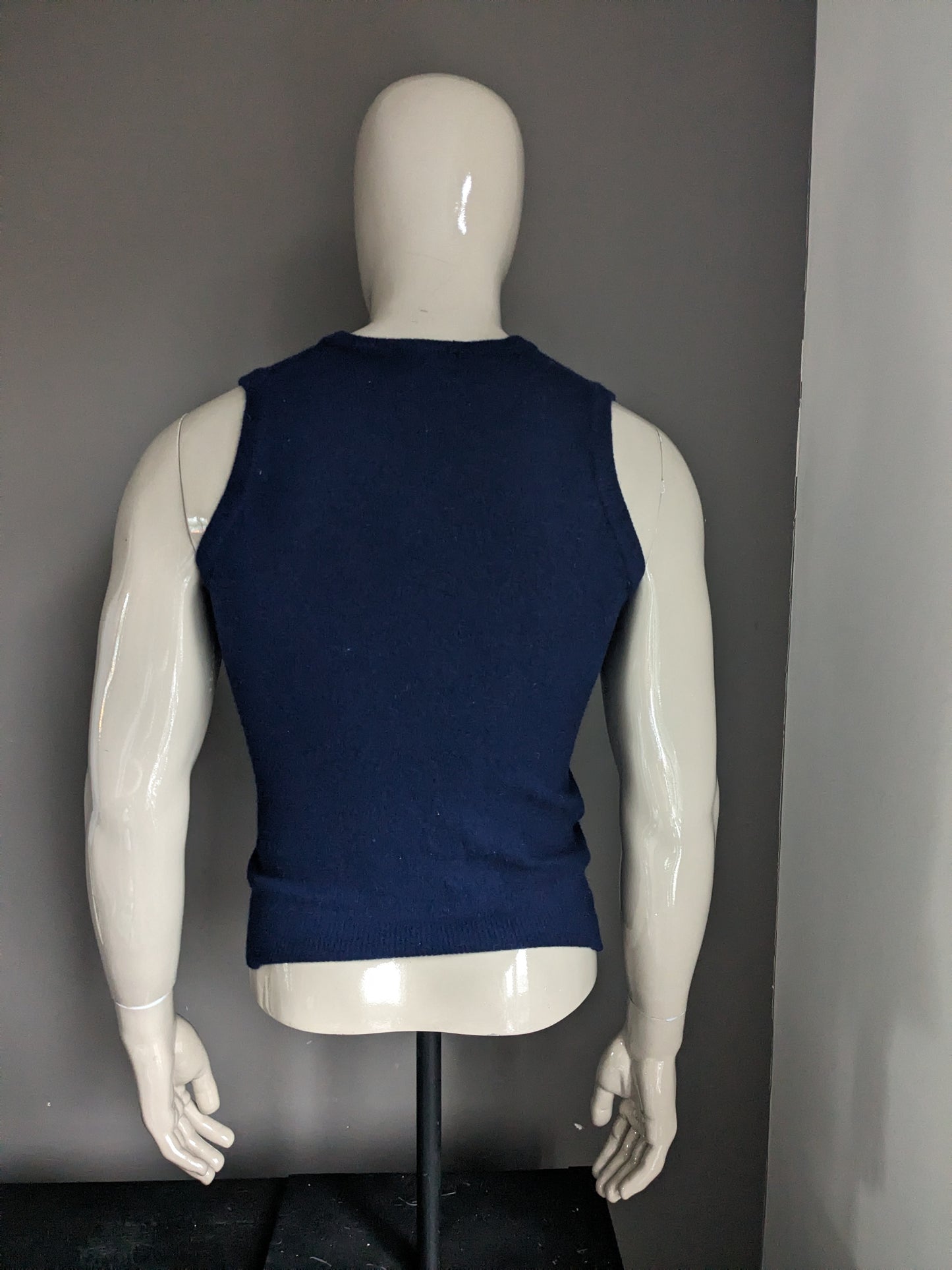 Spencer de lana. Color azul oscuro. Talla XS.