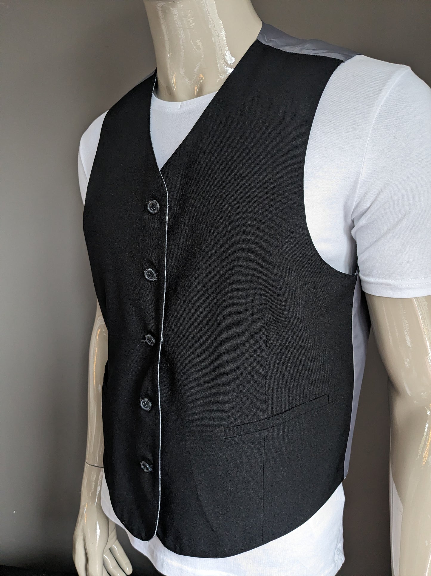 Double -sided waistcoat. A black and gray copy. Size 52 / L.