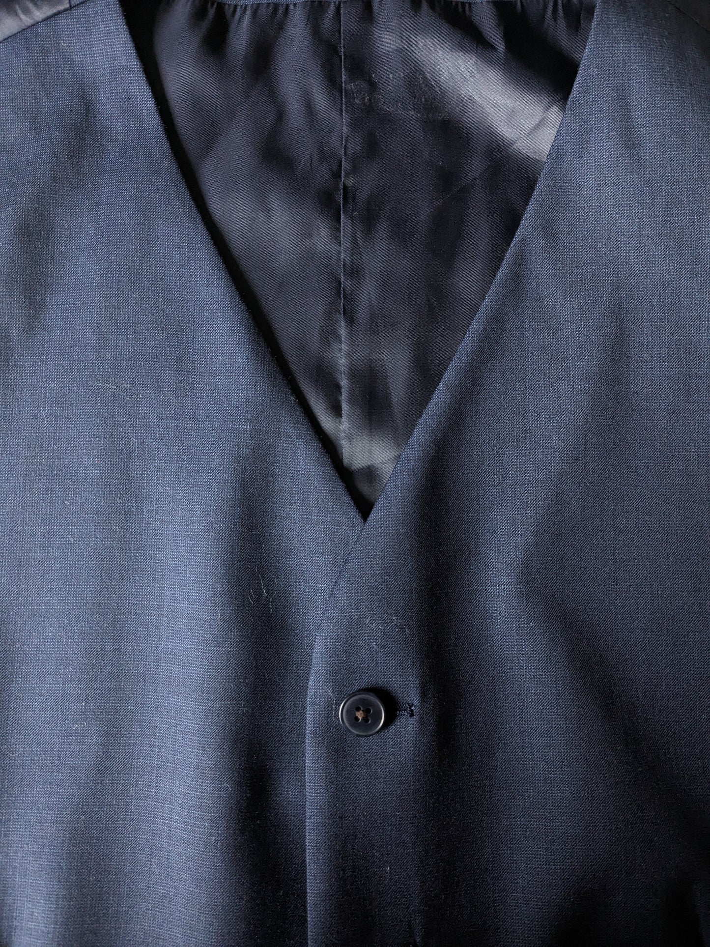 Gilet di lana di riley. Moto blu scuro. Dimensione 54 / L. 70% lana. #332
