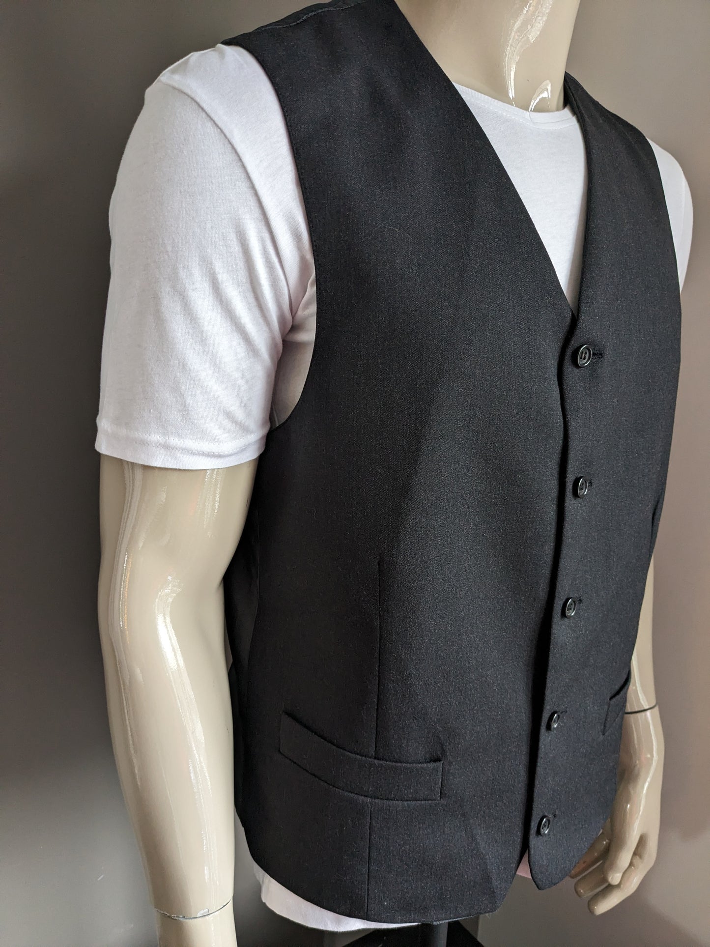 Chaleco de lana. Motivo gris oscuro. Talla L. #334