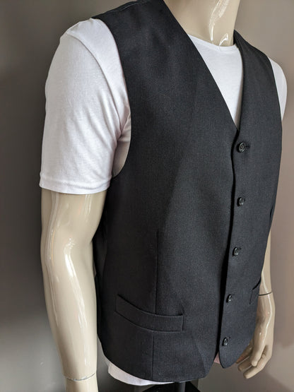 Chaleco de lana. Motivo gris oscuro. Talla L. #334