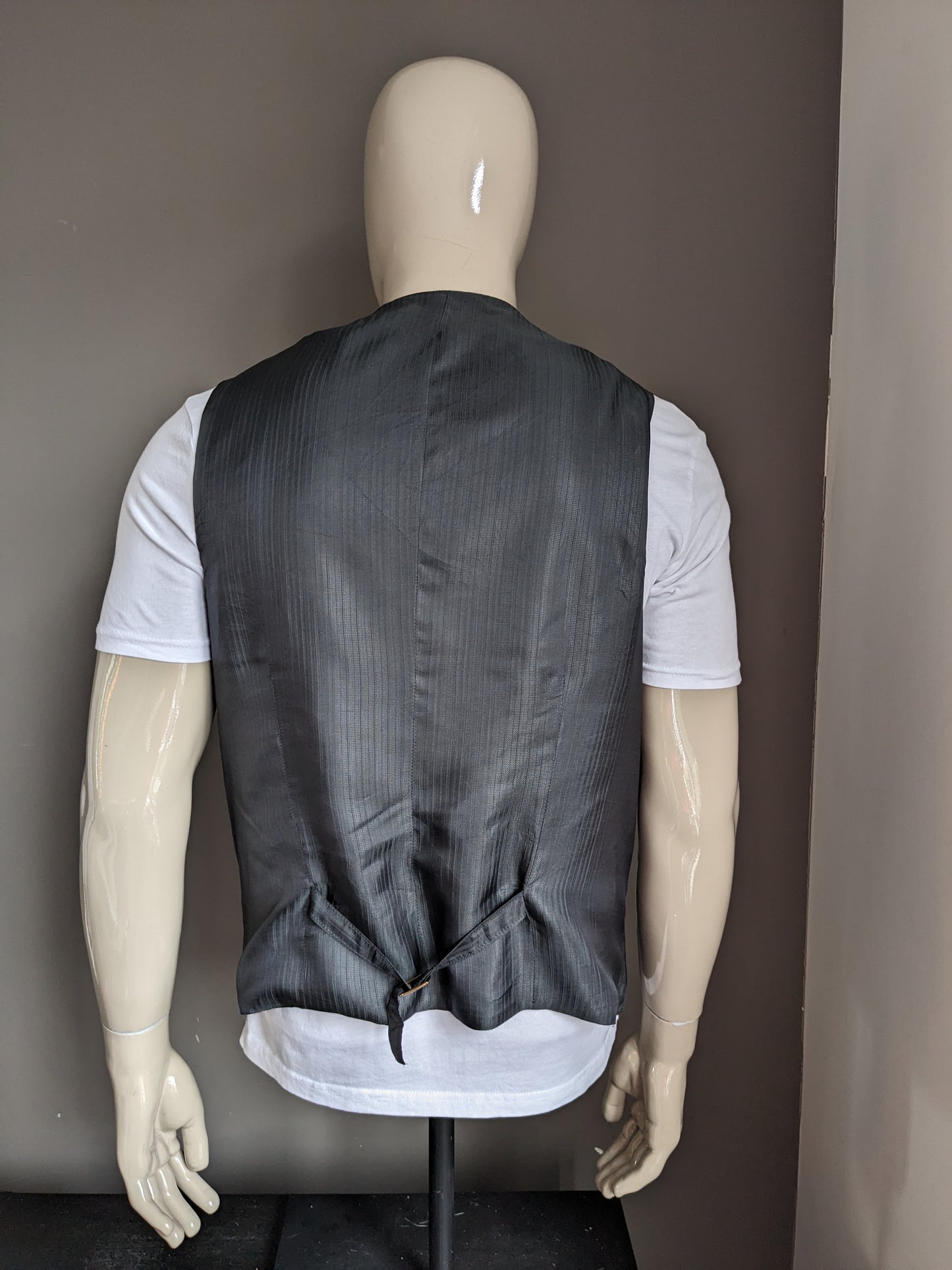 Chaleco de lana. Motivo gris oscuro. Talla L. #334