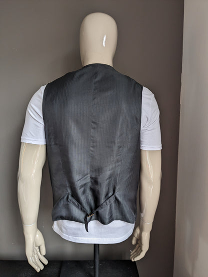 Chaleco de lana. Motivo gris oscuro. Talla L. #334