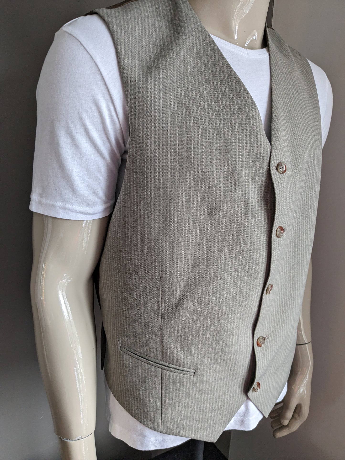Gilet. Gris marron rayé. Taille L.