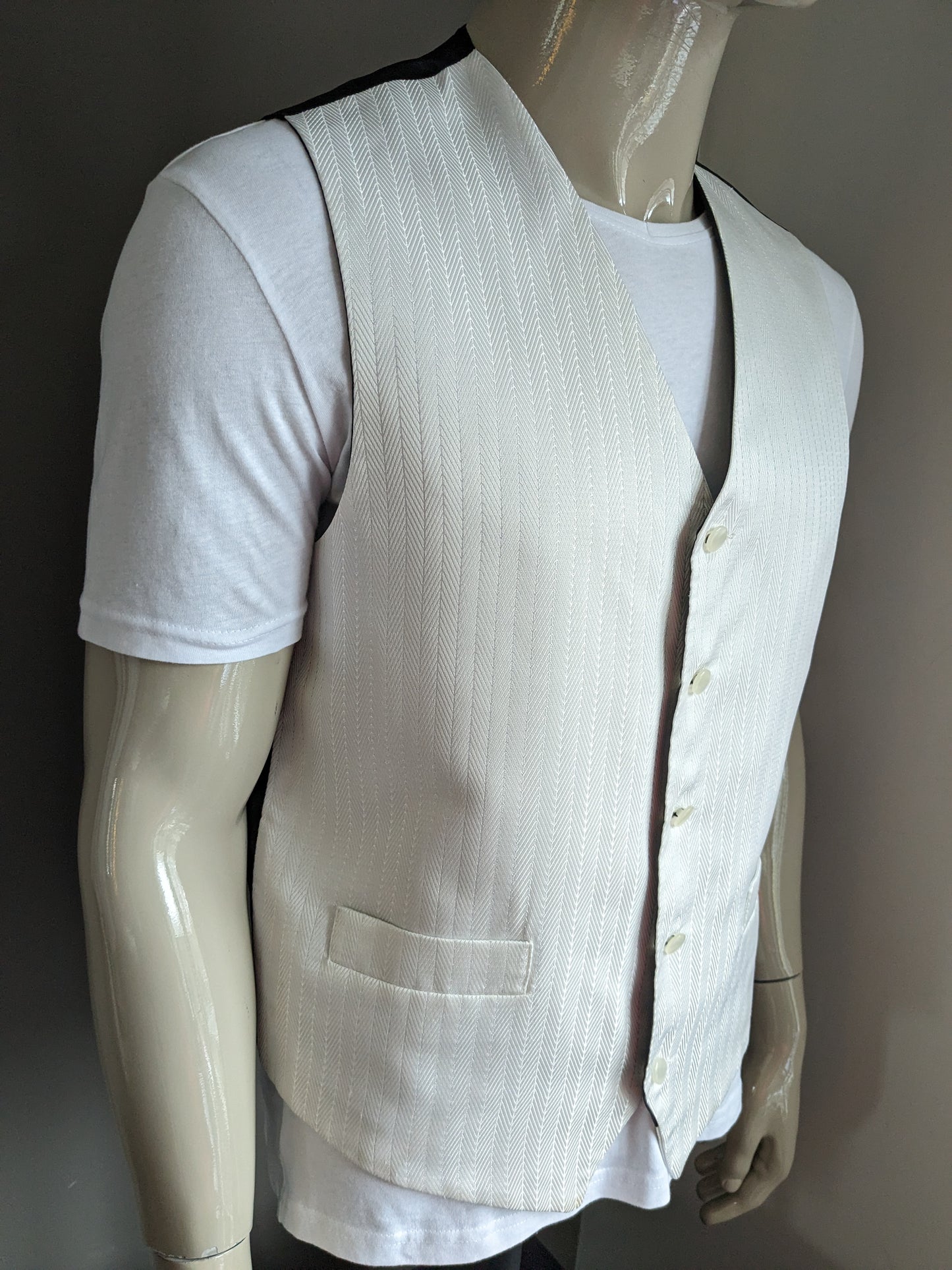 FH Gilet. Beige glanzend gestreept motief. Maat L.