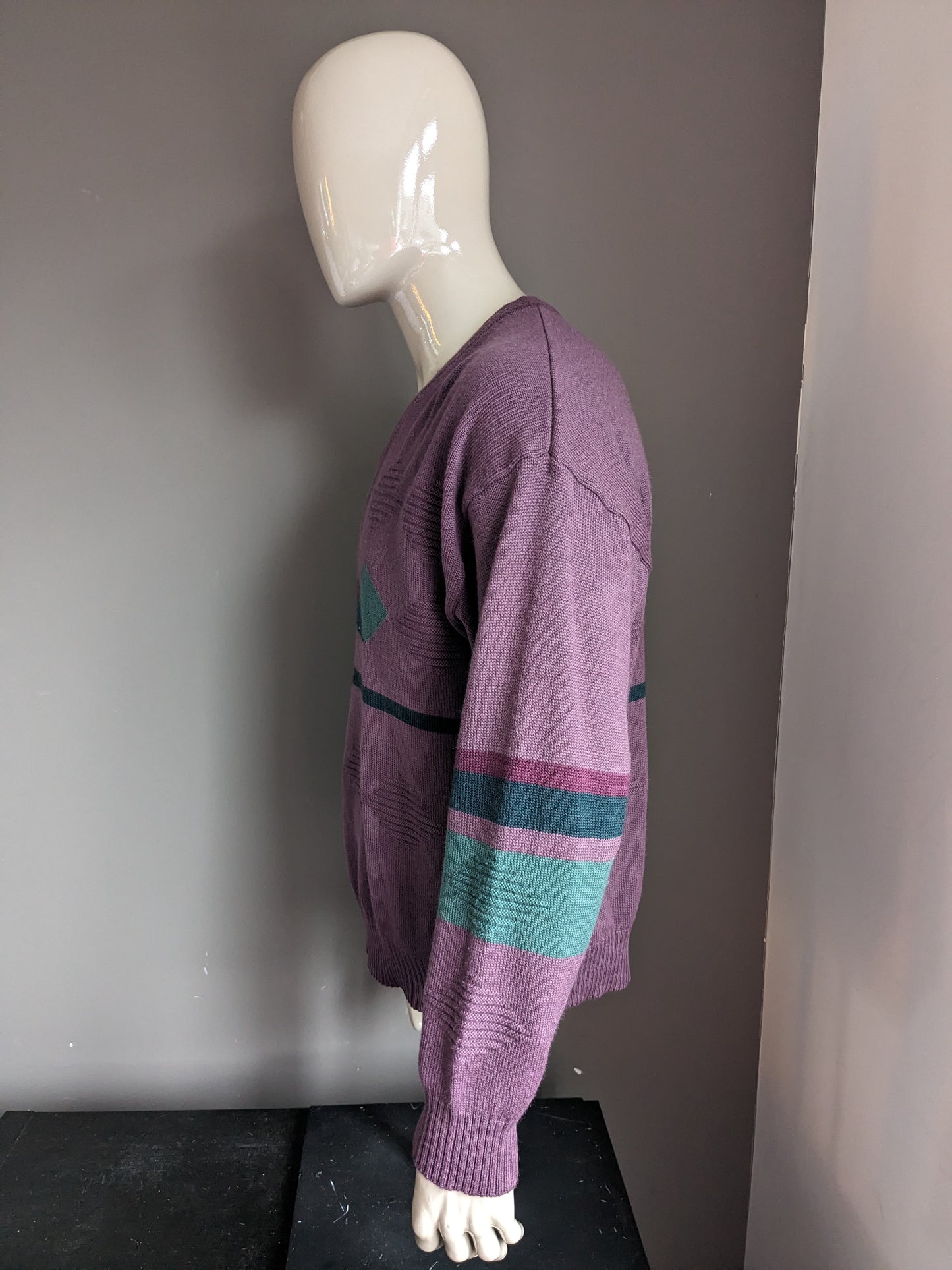 Suéter vintage soleado de lana con cuello en V. Color verde púrpura. Tamaño xl. 50% de lana.