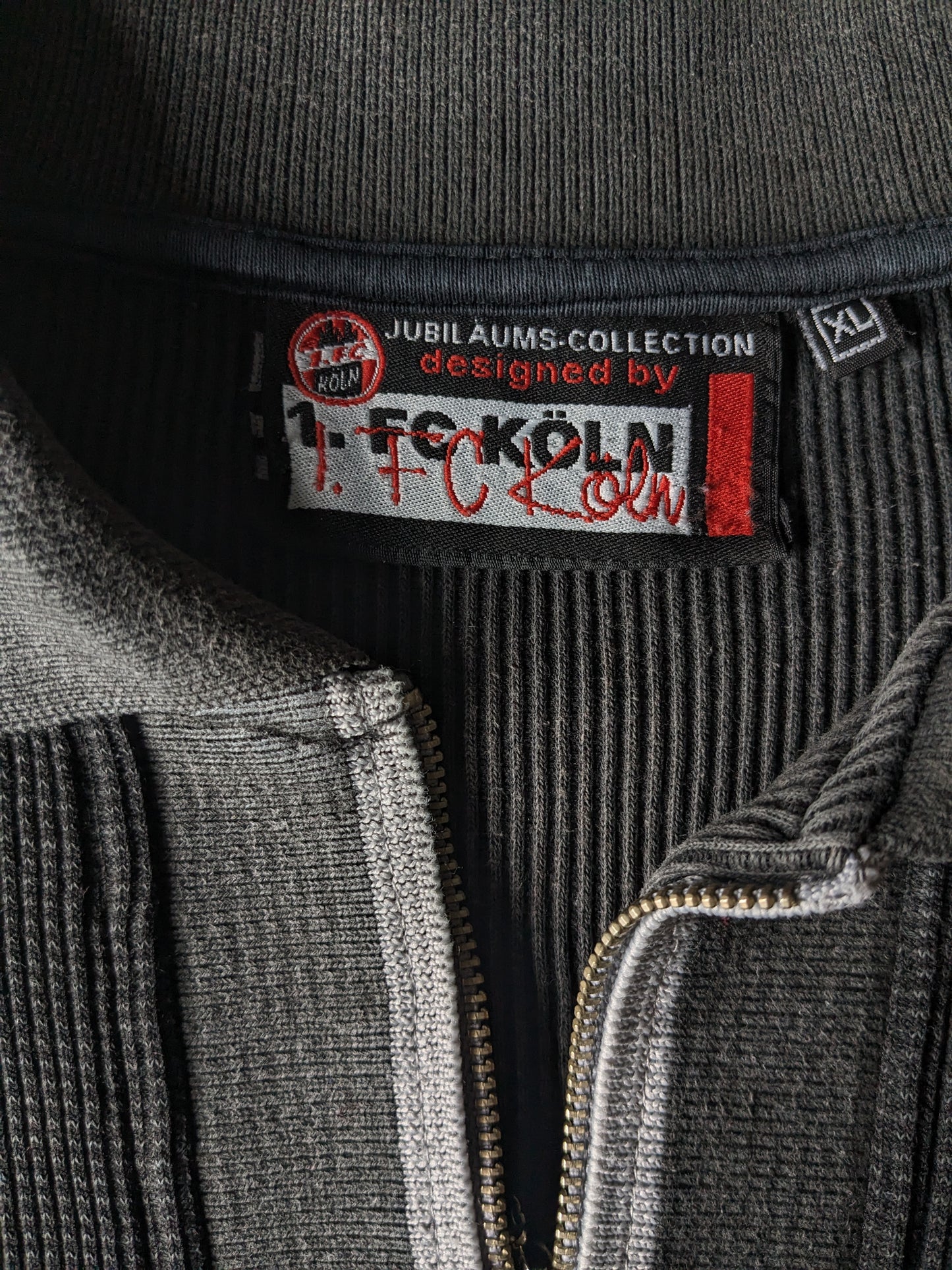 Unique jubilee FC Köln sweater with zipper. "50 years FC Köln". Dark gray colored. Size XL.