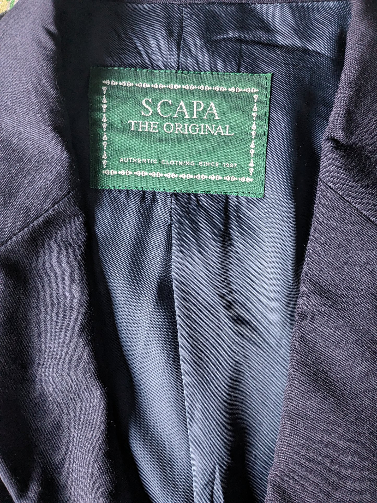Vintage scapa woolen jacket with beautiful buttons. Dark blue colored. Size 58 / XL.