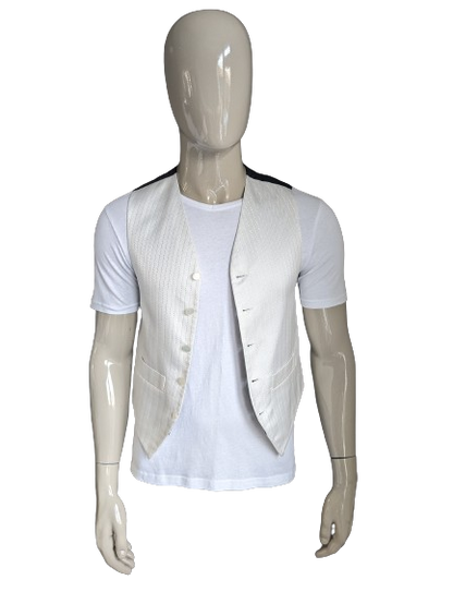 Gilet FH. Motif de couleur argent blanc. Taille S.