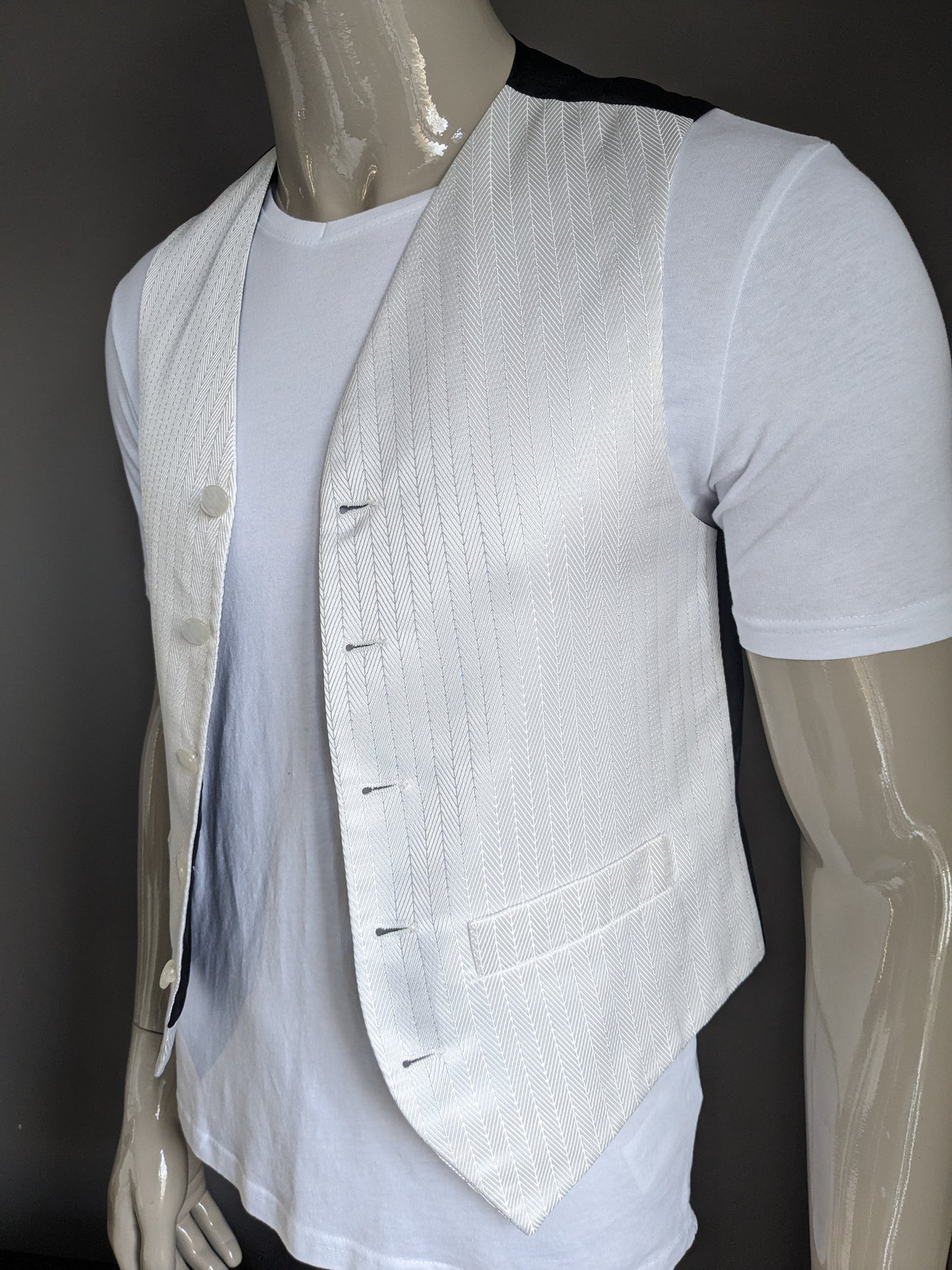 FH waistcoat. White silver -colored motif. Size S.