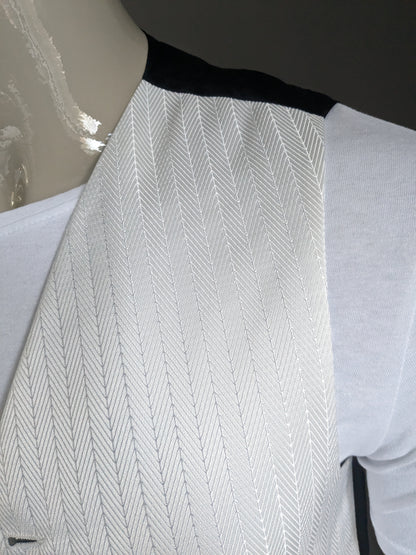 Gilet FH. Motif de couleur argent blanc. Taille S.