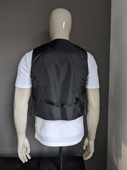 Gilet FH. Motif de couleur argent blanc. Taille S.