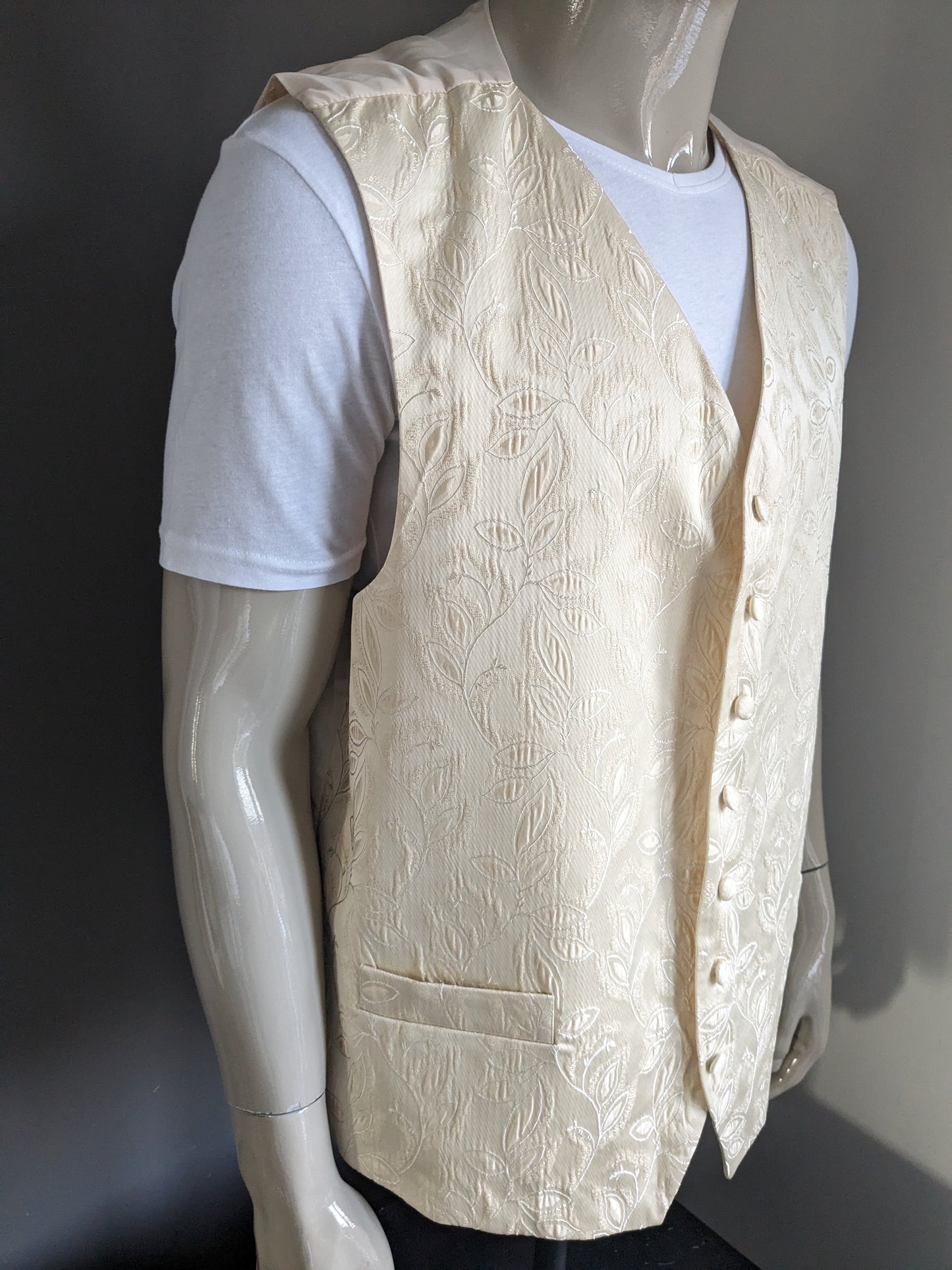FH-Weste. Beigefarbenes Motiv. Größe 3XL / XXXL.