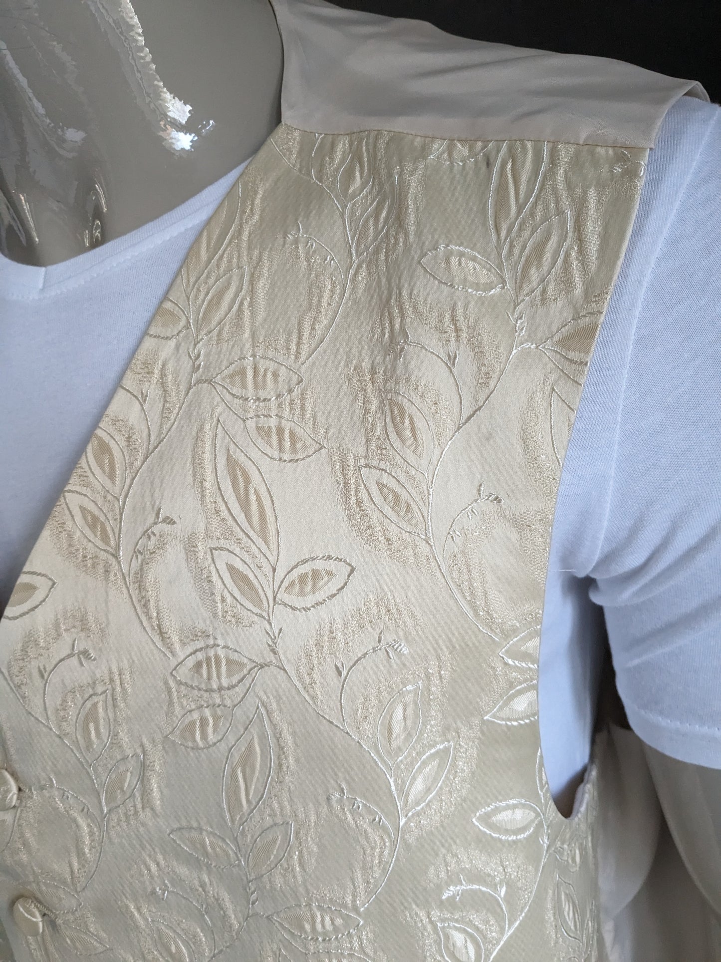 FH-Weste. Beigefarbenes Motiv. Größe 3XL / XXXL.