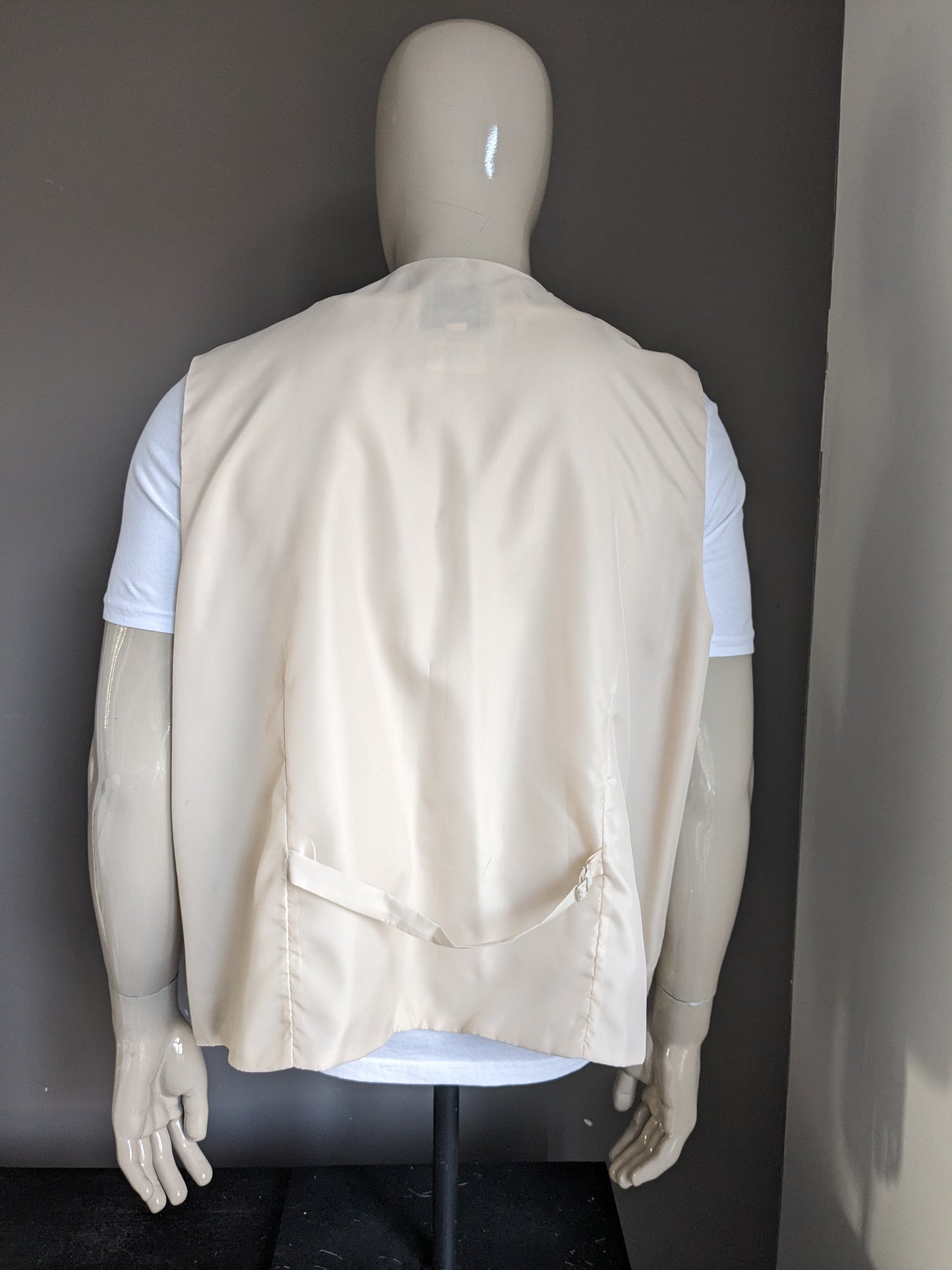 FH-Weste. Beigefarbenes Motiv. Größe 3XL / XXXL.
