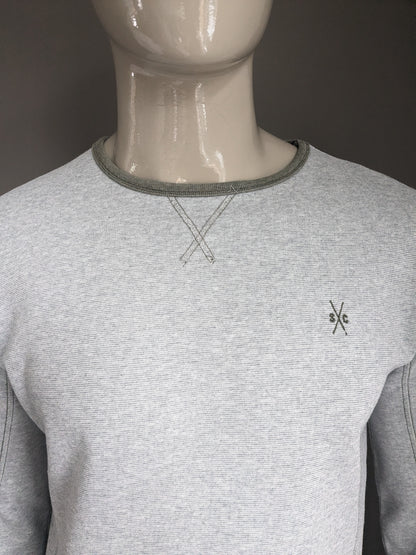 SilverCreek-Pullover mit Daumenlöchern. Graugrün gestreift. Größe M.