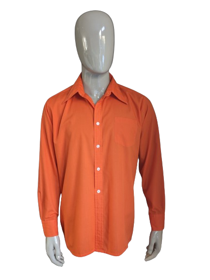 Vintage 70's Curo shirt with point collar. Orange colored. Size XL.