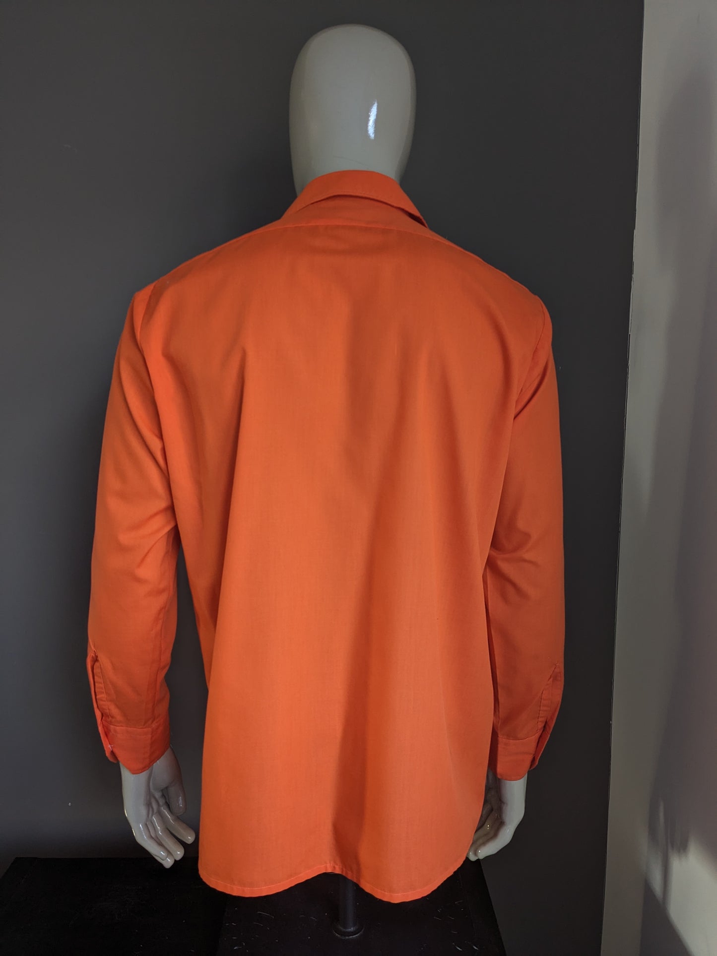 Vintage 70's Curo shirt with point collar. Orange colored. Size XL.