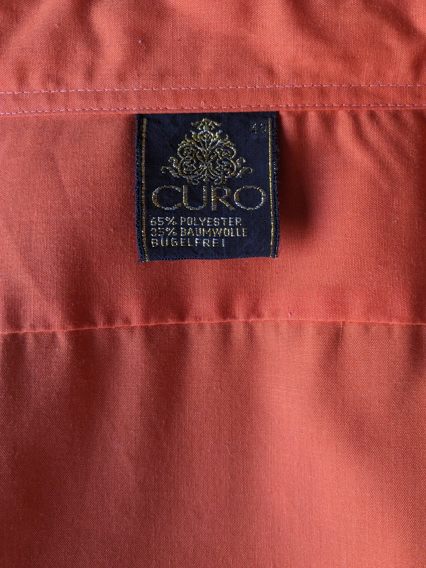 Vintage 70's Curo overhemd met puntkraag. Oranje gekleurd. Maat XL.