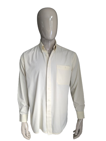 Vintage 70's Marcello shirt with point collar. Light yellow colored. Size XL.