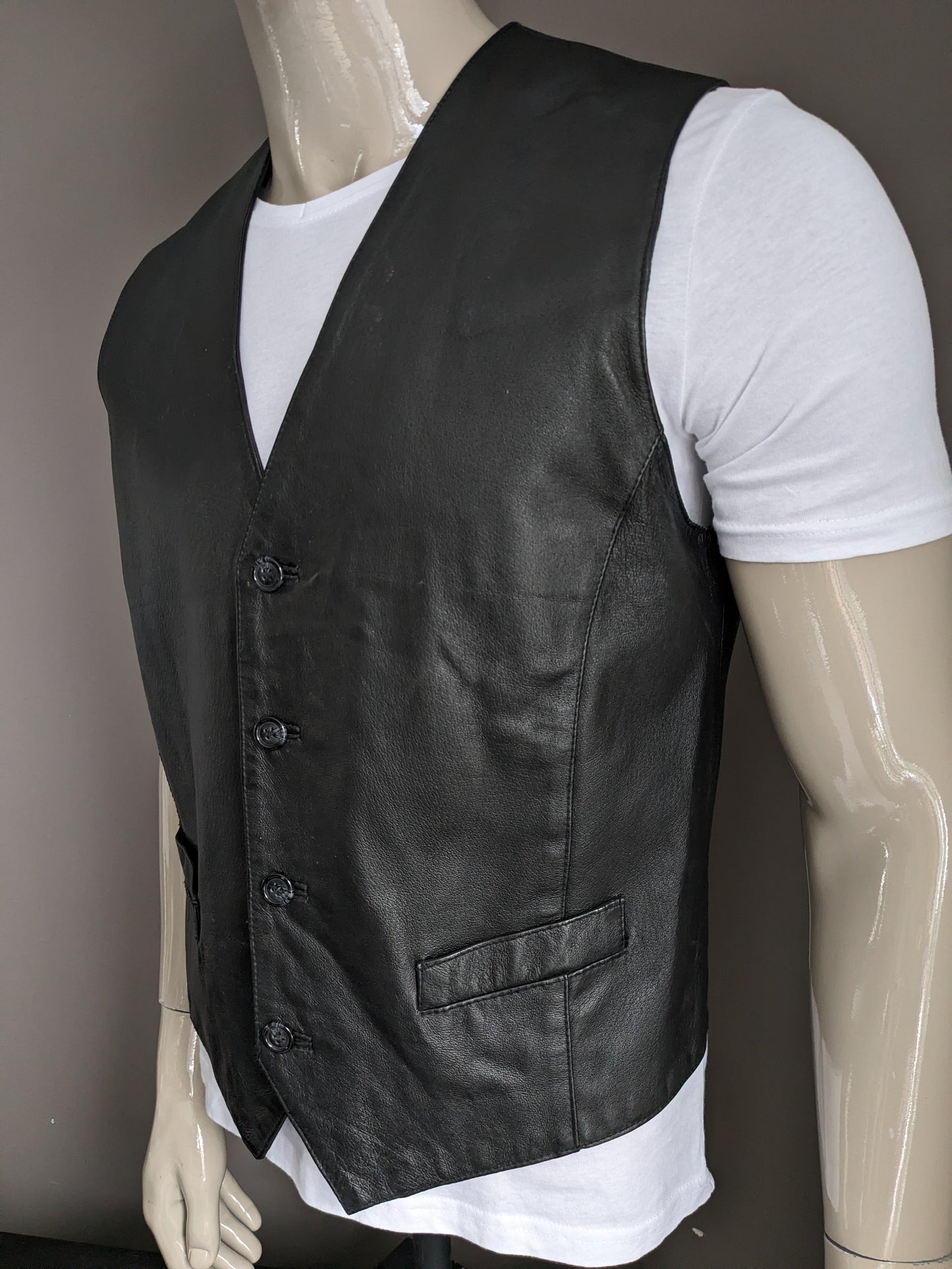 Gilet en cuir de porc Conwell. Double face. Noir XL avec poche intérieure.