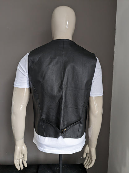 Gilet en cuir de porc Conwell. Double face. Noir XL avec poche intérieure.