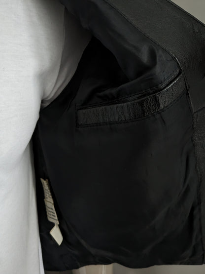 Gilet en cuir de porc Conwell. Double face. Noir XL avec poche intérieure.