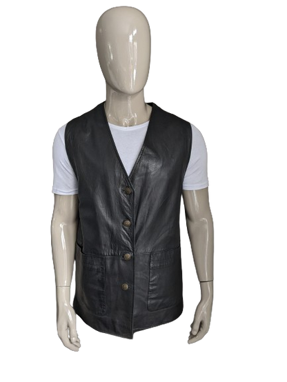 Mid-length double-sided leather waistcoat with beautiful buttons. Dark brown. Size L.