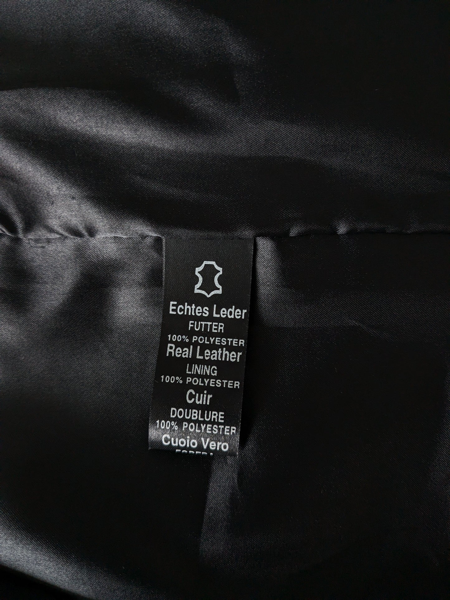 Mid-length double-sided leather waistcoat with beautiful buttons. Dark brown. Size L.