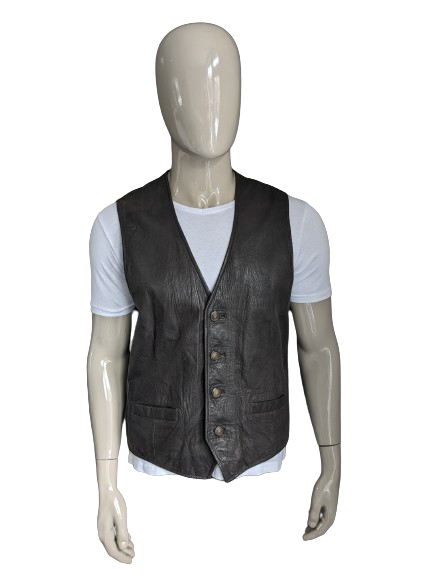 Double -sided leather waistcoat with beautiful buttons. . Dark brown. Size L. #320