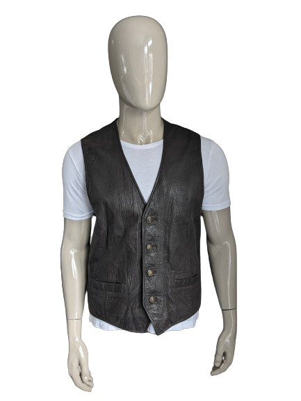 Chaleco de piel de doble faz con bonitos botones. . Marrón oscuro. Talla L. #320