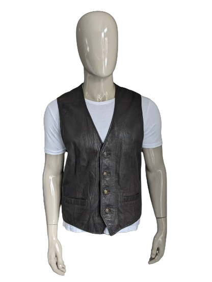 Chaleco de piel de doble faz con bonitos botones. . Marrón oscuro. Talla L. #320
