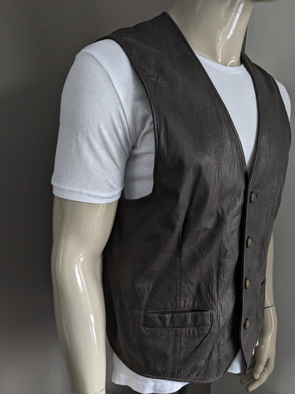 Chaleco de piel de doble faz con bonitos botones. . Marrón oscuro. Talla L. #320