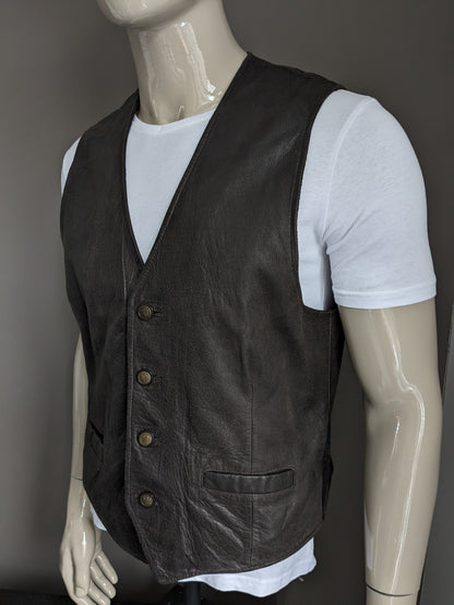 Chaleco de piel de doble faz con bonitos botones. . Marrón oscuro. Talla L. #320