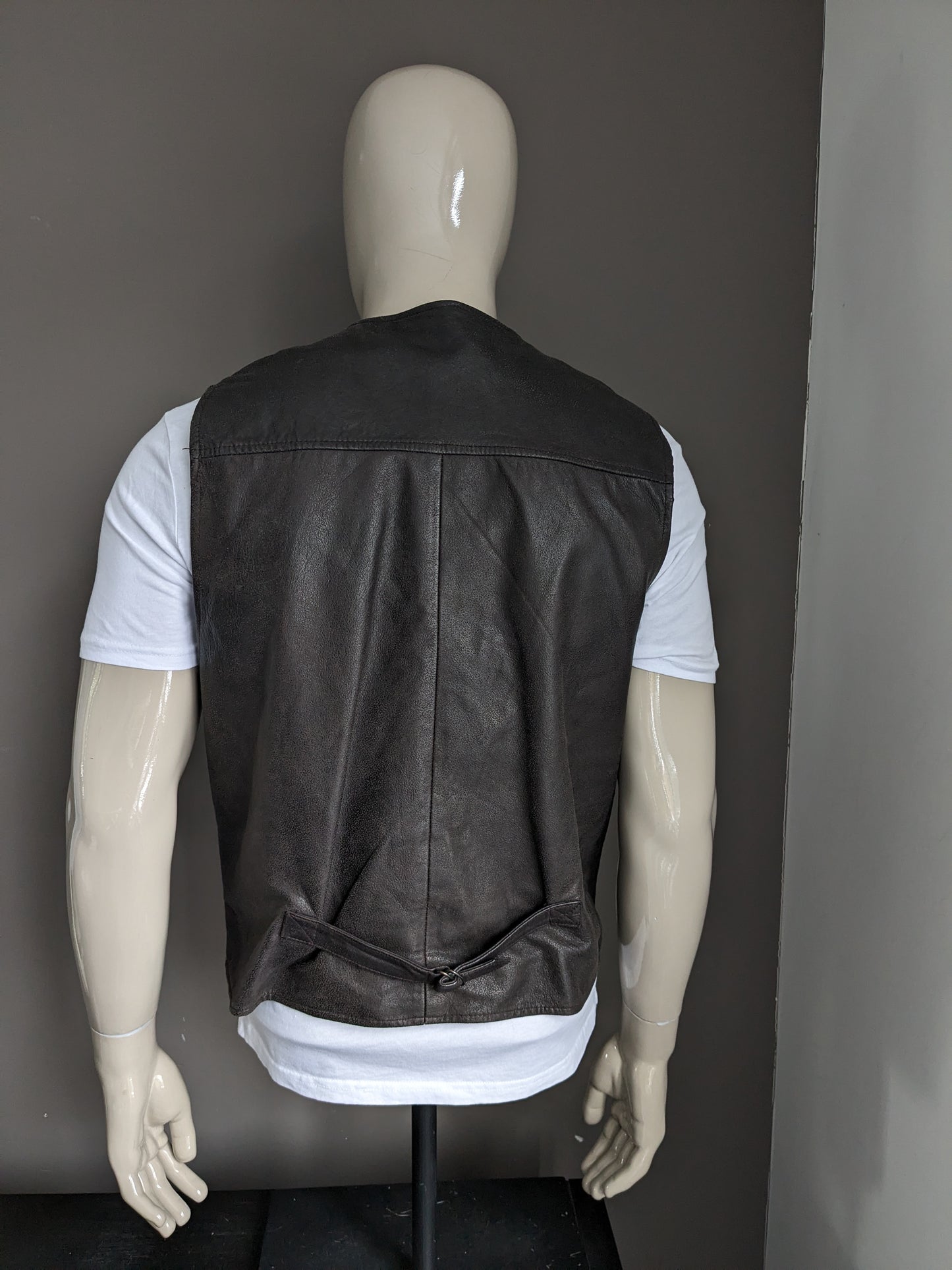 Chaleco de piel de doble faz con bonitos botones. . Marrón oscuro. Talla L. #320