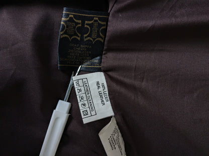 Chaleco de piel de doble faz con bonitos botones. . Marrón oscuro. Talla L. #320