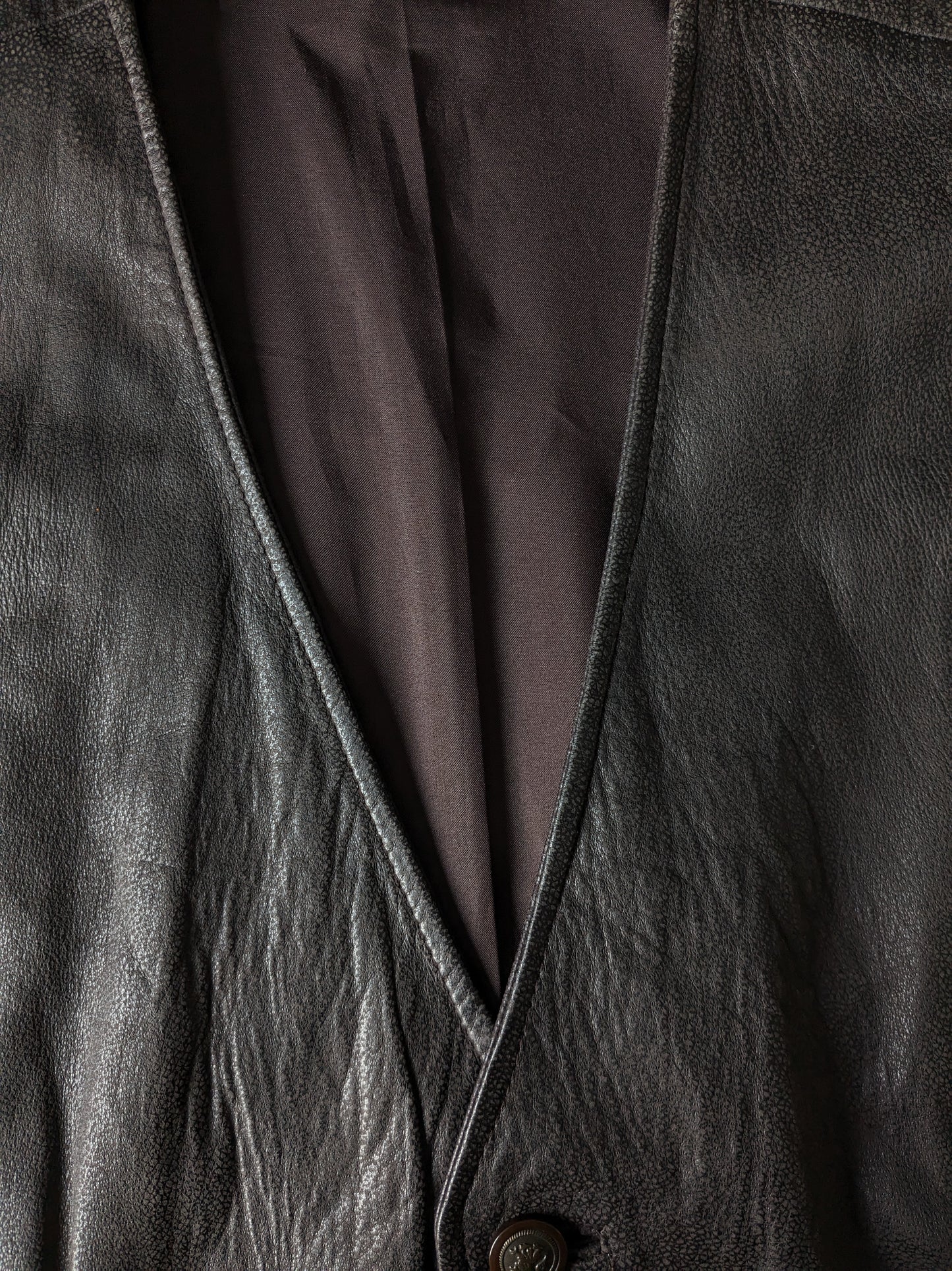 Chaleco de piel de doble faz con bonitos botones. . Marrón oscuro. Talla L. #320