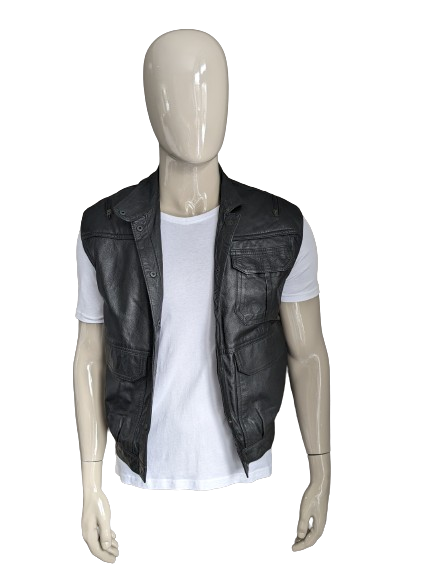 Vintage 80's C&A leren bodywarmer / gilet met zakken, rits applicaties en drukknopen. Zwart. Maat M.